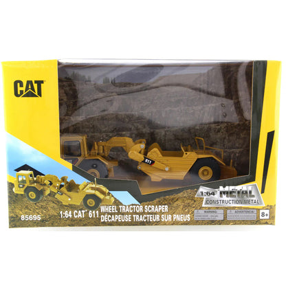 Model of a Caterpillar 611 Wheel Tractor Scraper in Cardboard Window Box Packaging on a White Background