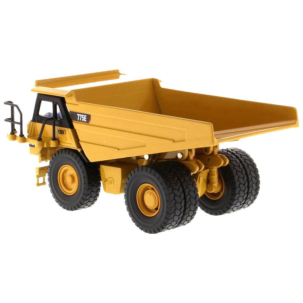 Model of a Caterpillar 775E Off-Highway Dump Truck on a White Background