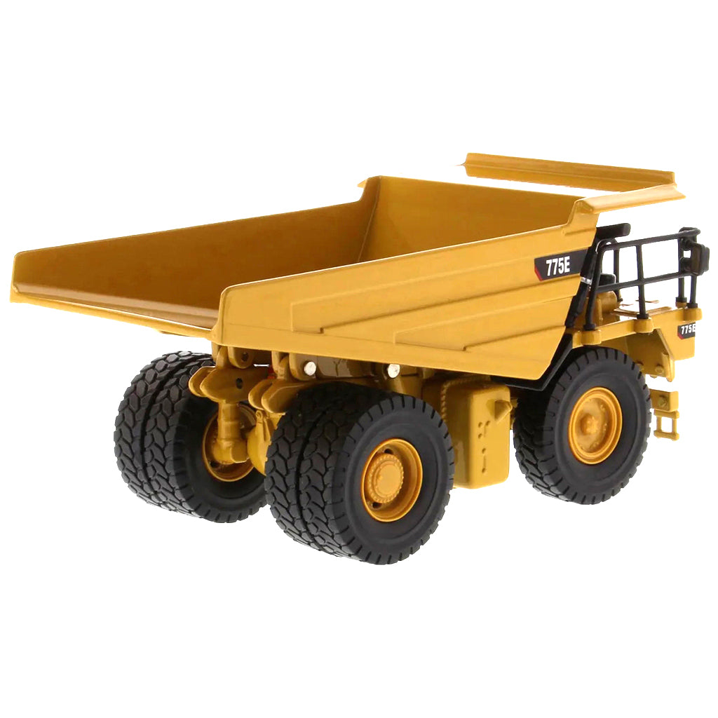 Model of a Caterpillar 775E Off-Highway Dump Truck on a White Background
