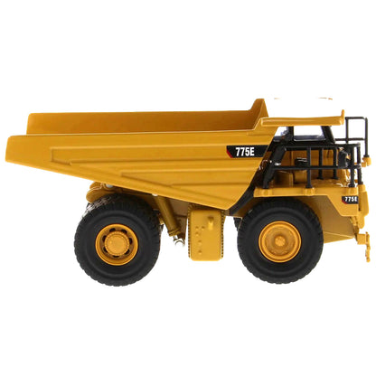 Model of a Caterpillar 775E Off-Highway Dump Truck on a White Background