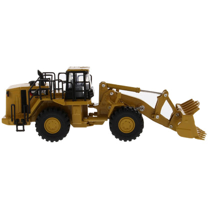 Model of a Caterpillar 988H Wheel Loader on a White Background