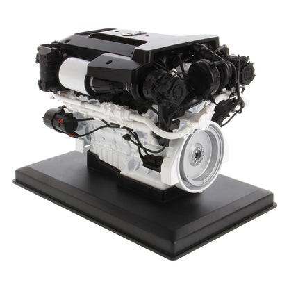 Model of a Caterpillar C32B Marine Diesel Engine on a white background