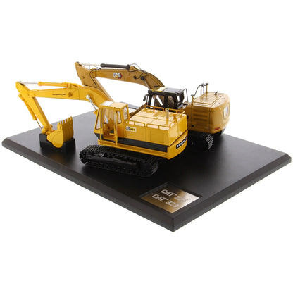 Two Caterpillar Excavator Models on a Black Base and White Background