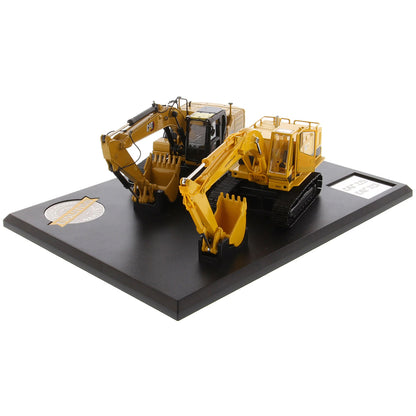 Two Caterpillar Excavator Models on a Black Base and White Background