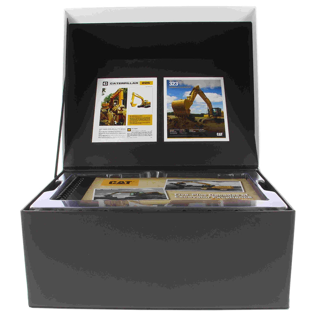 Two Caterpillar Excavator Models In Their Box on a White Background 