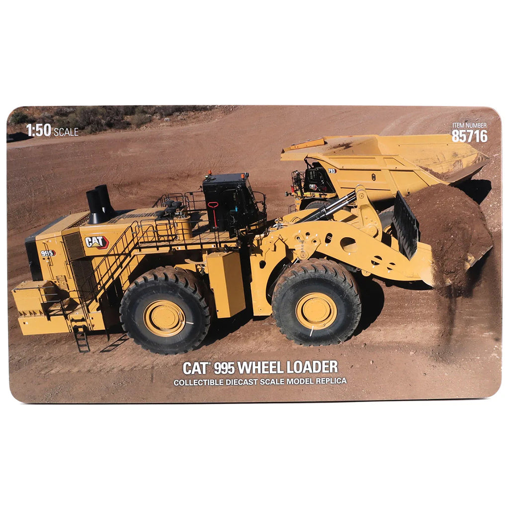 Model of a CAT 995 Wheel Loader on a display card with '1:50 Scale' text.