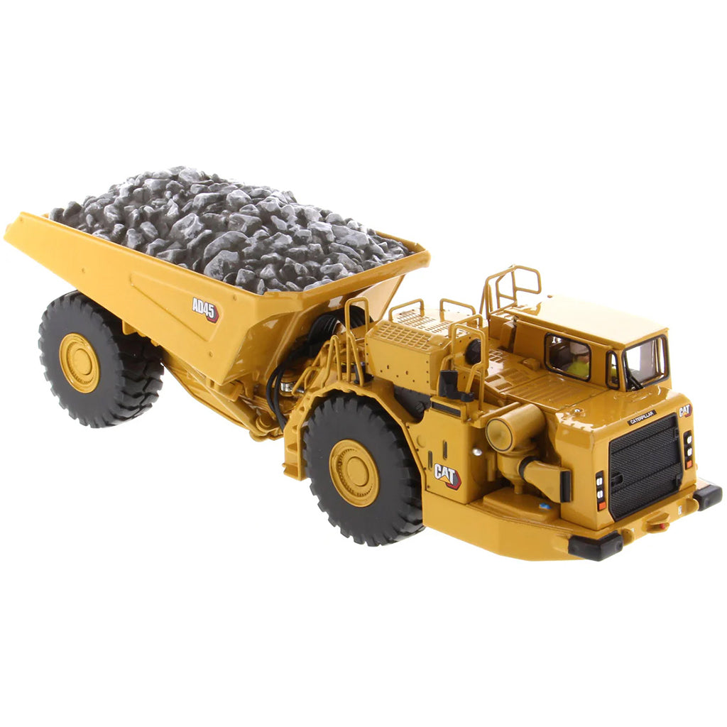Model of a Caterpillar AD45 Underground Articulated Dump Truck with a Load of Coal on a White Background