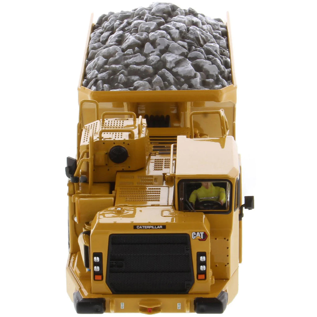 Model of a Caterpillar AD45 Underground Articulated Dump Truck with a Load of Coal on a White Background