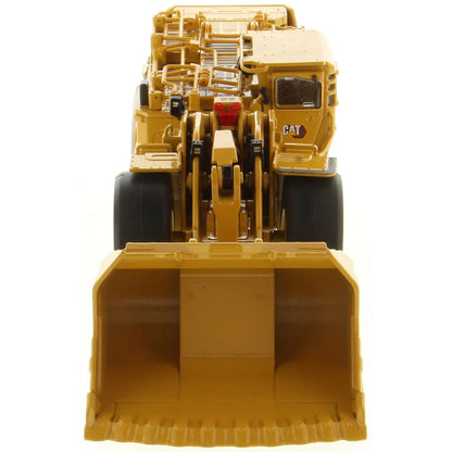 Model of a Caterpillar R2900 XE Underground Mining Loader on a White Background