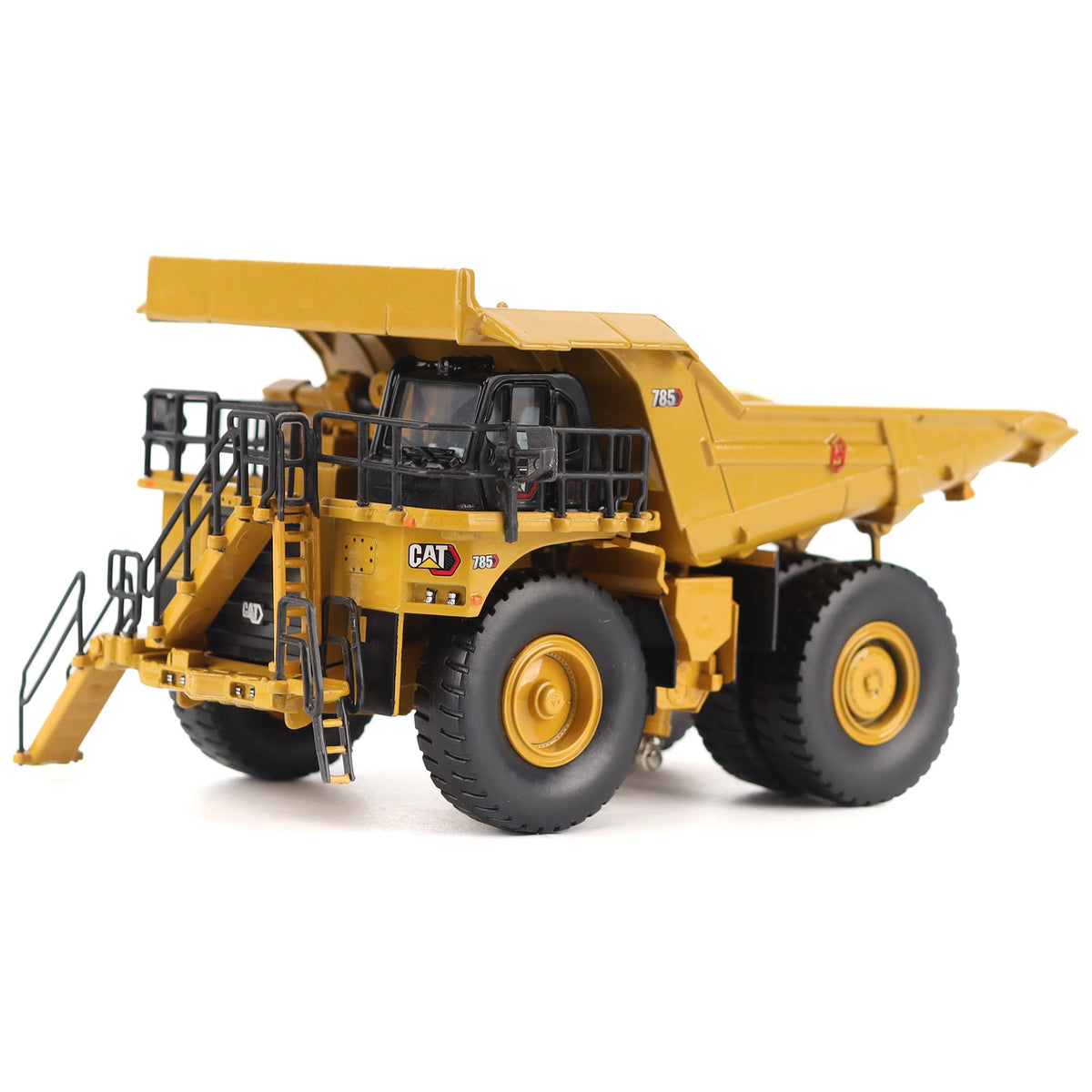 1/87th Scale Diecast Model of a CAT Yellow and Black Caterpillar 785 Mining Dump Truck Photographed on a White Background