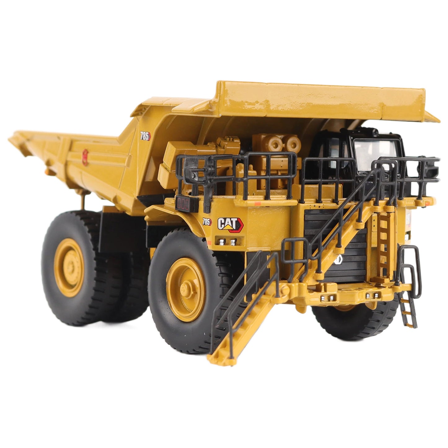 1/87th Scale Diecast Model of a CAT Yellow and Black Caterpillar 785 Mining Dump Truck Photographed on a White Background