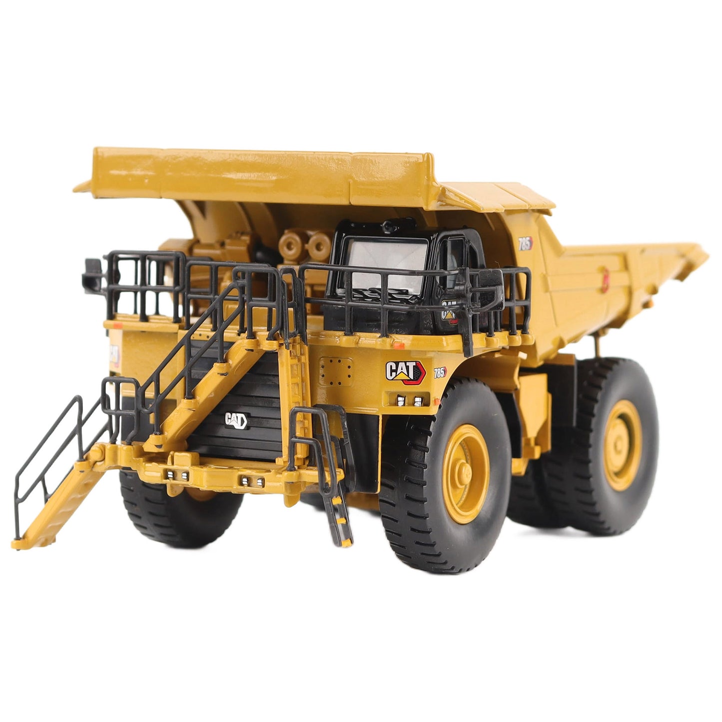 1/87th Scale Diecast Model of a CAT Yellow and Black Caterpillar 785 Mining Dump Truck Photographed on a White Background
