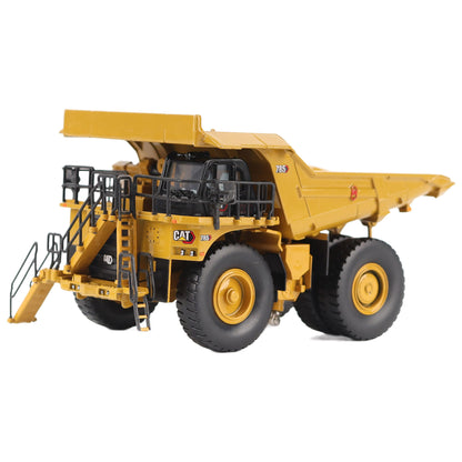 1/87th Scale Diecast Model of a CAT Yellow and Black Caterpillar 785 Mining Dump Truck Photographed on a White Background