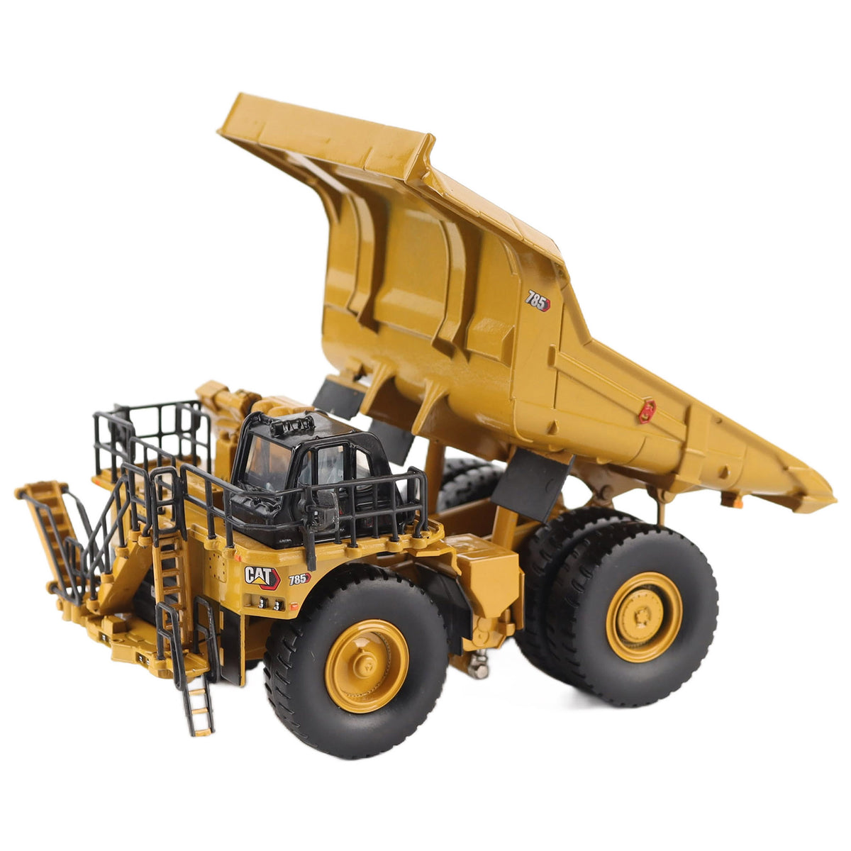 1/87th Scale Diecast Model of a CAT Yellow and Black Caterpillar 785 Mining Dump Truck Photographed on a White Background