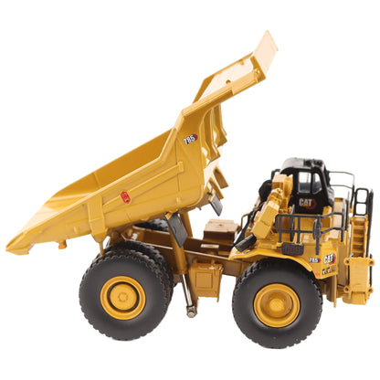 1/87th Scale Diecast Model of a CAT Yellow and Black Caterpillar 785 Mining Dump Truck Photographed on a White Background