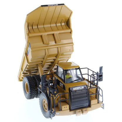 Model of a Weathered Caterpillar 770 Off-Highway Dump Truck on a White Background