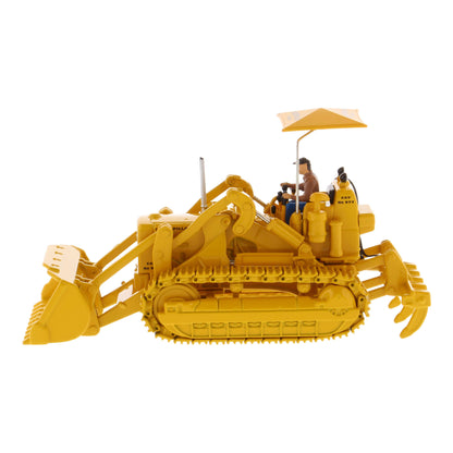 1:50th Scale CAT Yellow Diecast Model of a Caterpillar 977D Traxcavator Track-Type Loader with Driver and Shade Umbrella Photographed on a White Background