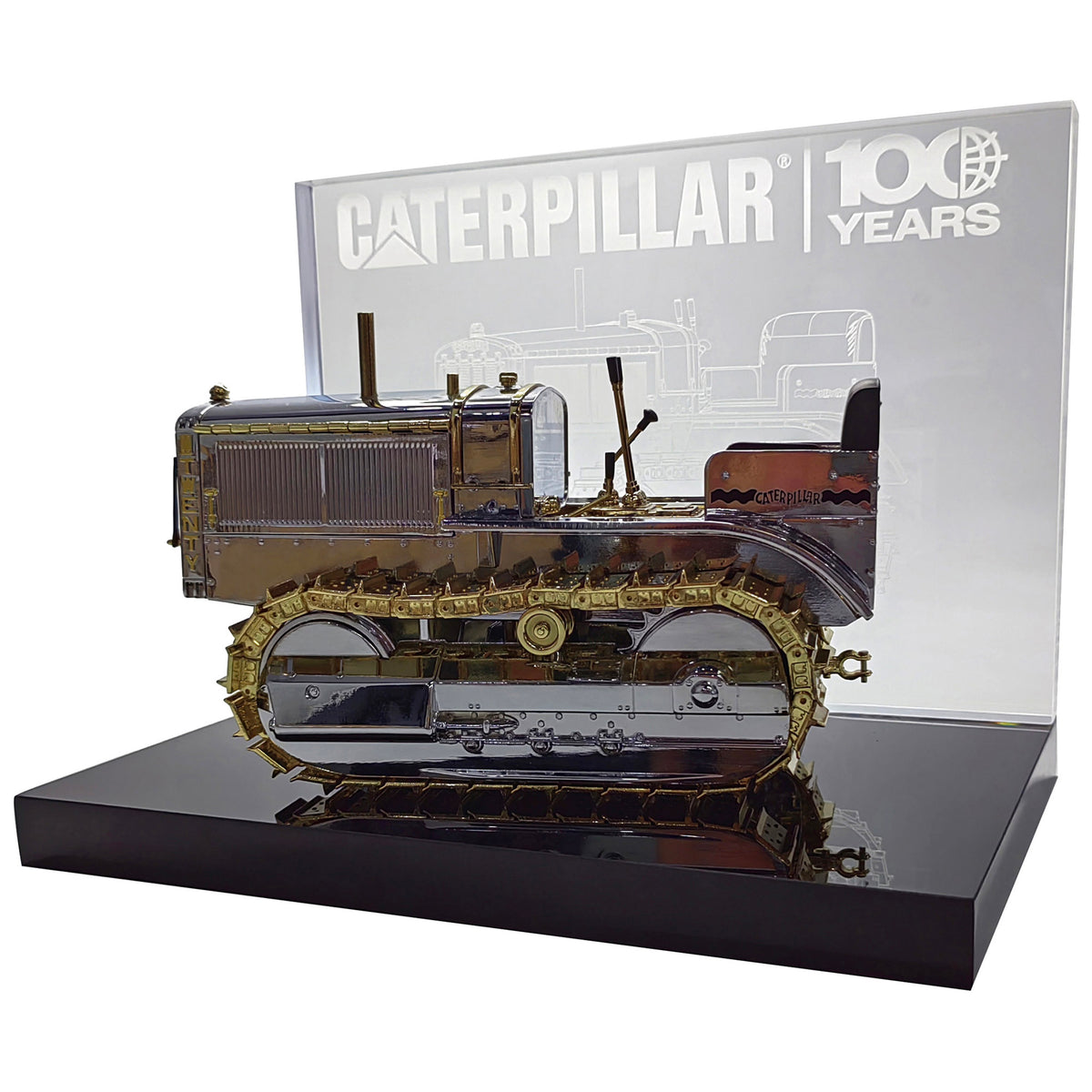 1:16th Scale Diecast Model of a Caterpillar Twenty Crawler Tractor that is Chrome Plated with Gold Plated Accents Photographed on a White Background