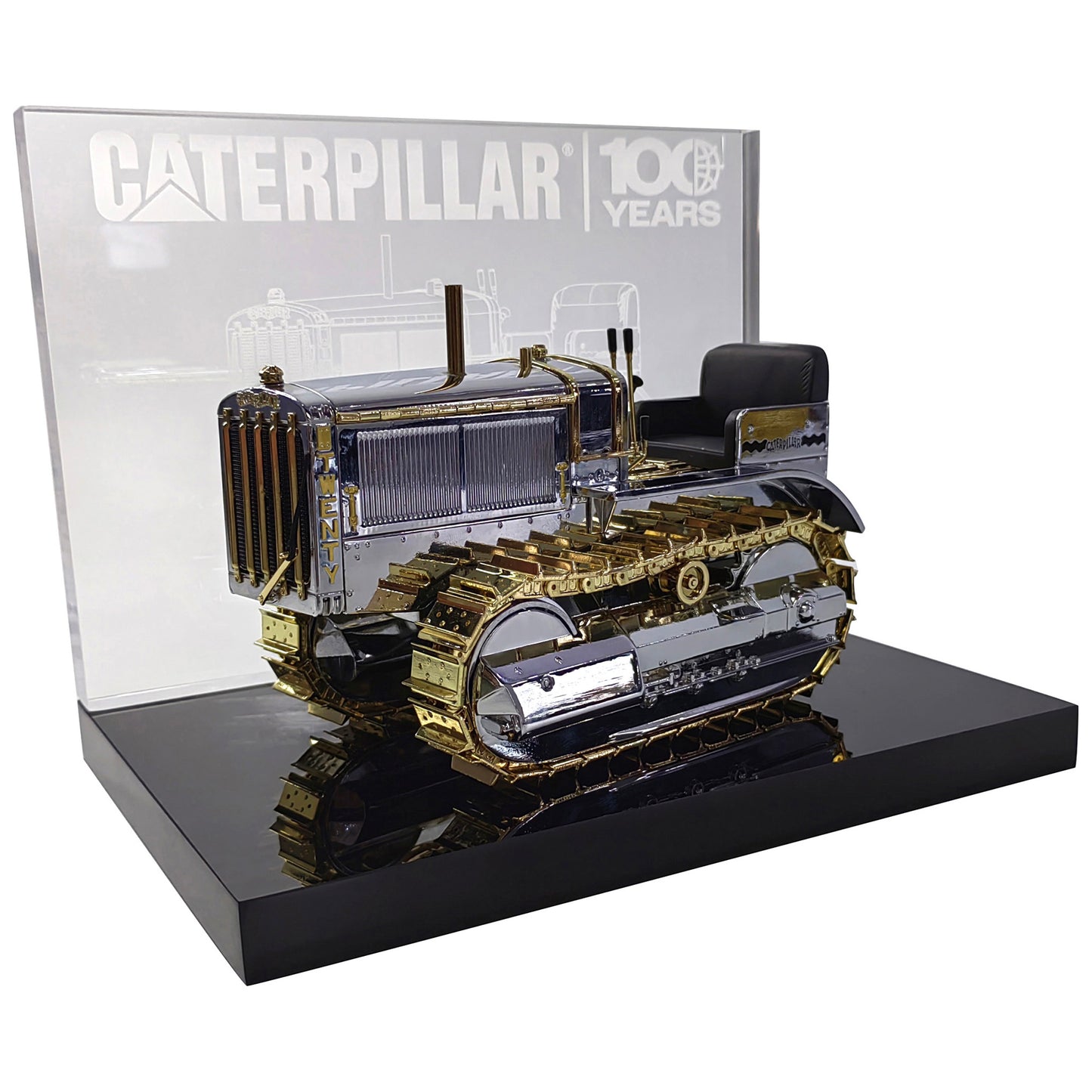 1:16th Scale Diecast Model of a Caterpillar Twenty Crawler Tractor that is Chrome Plated with Gold Plated Accents Photographed on a White Background