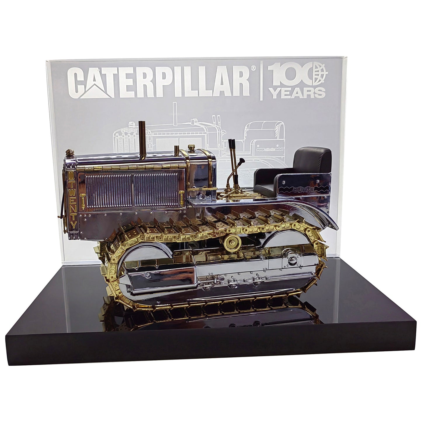 1:16th Scale Diecast Model of a Caterpillar Twenty Crawler Tractor that is Chrome Plated with Gold Plated Accents Photographed on a White Background