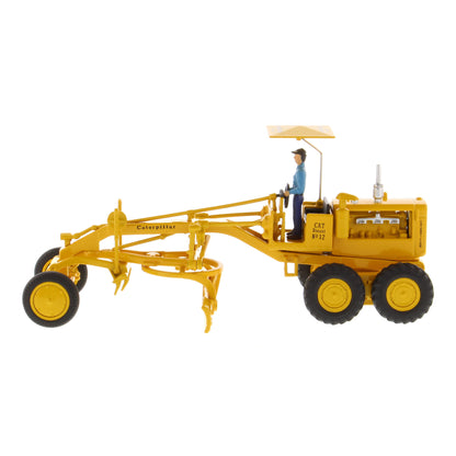 1:50th Scale CAT Yellow Diecast Model of a Caterpillar No. 12 Road Grader with Driver and Shade Umbrella Photographed on a White Background
