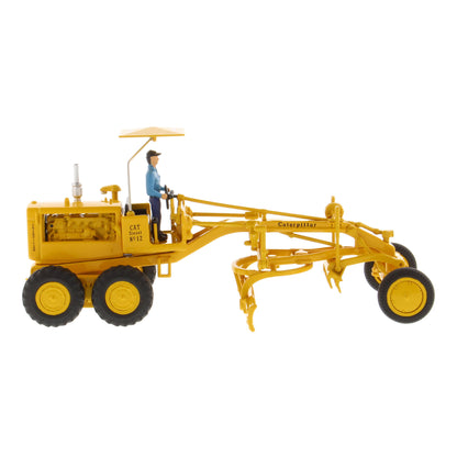 1:50th Scale CAT Yellow Diecast Model of a Caterpillar No. 12 Road Grader with Driver and Shade Umbrella Photographed on a White Background