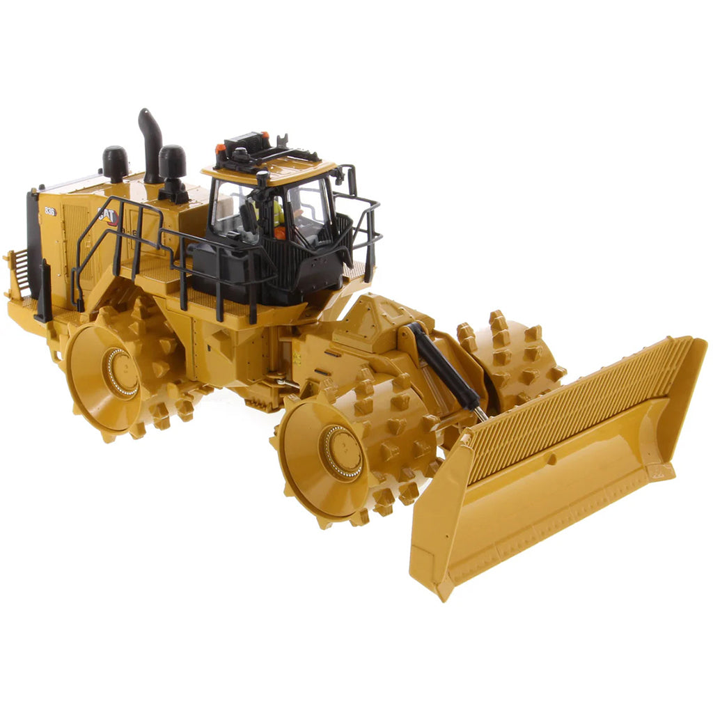 Model of a Caterpillar 836 Landfill Compactor on a White Background