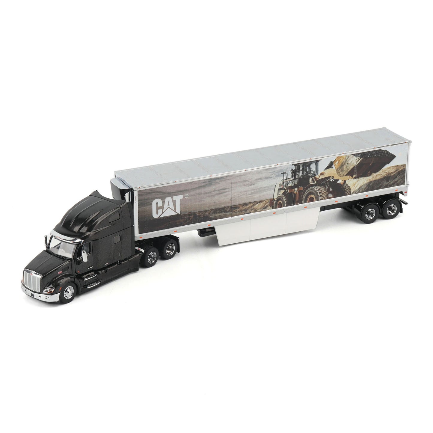 A die-cast model of a semi-truck with a black cab and a silver trailer featuring a CAT logo and a construction scene graphic, shown on a white background.