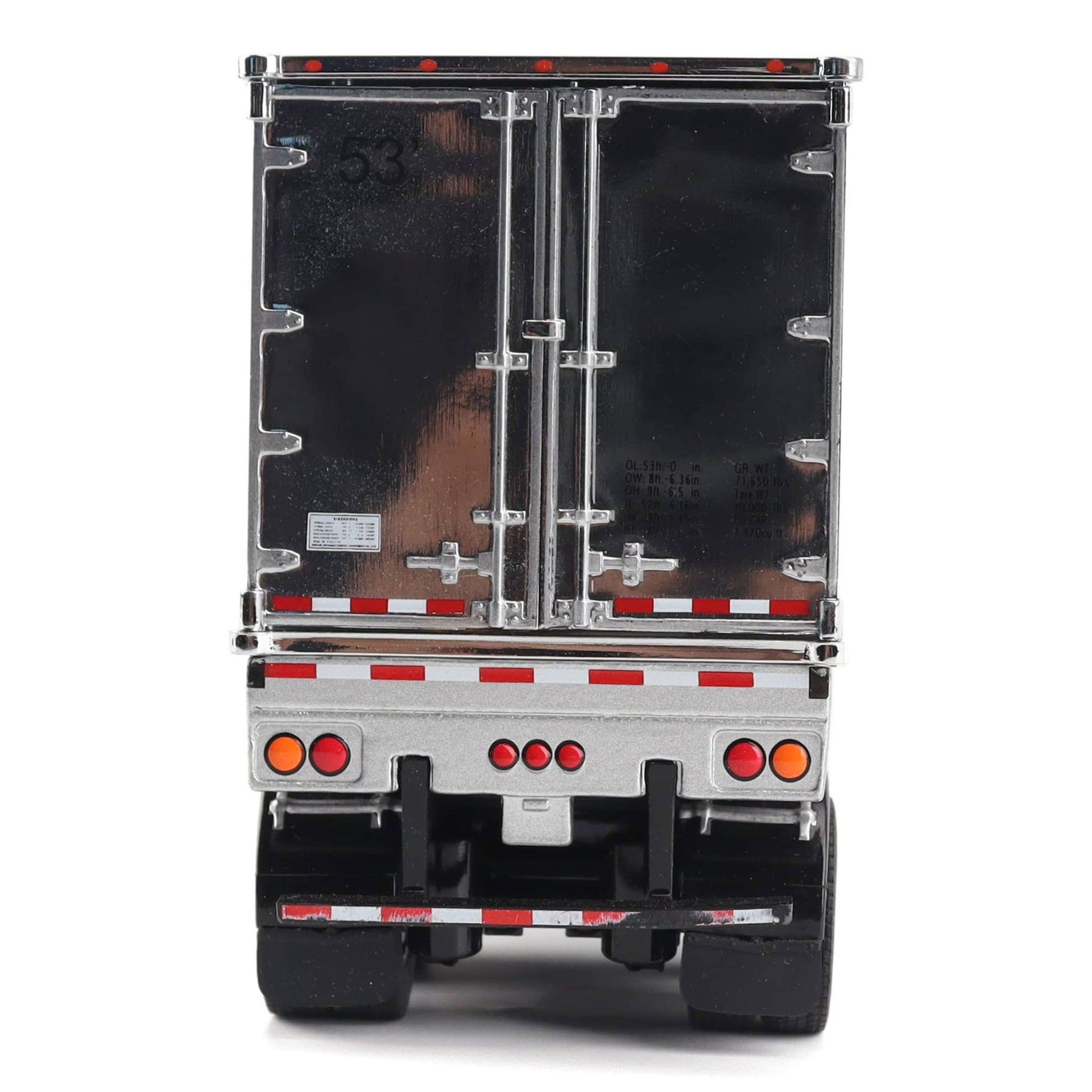 A miniature toy model of the back of a silver cargo truck with black doors and black tires, shown on a plain white background.