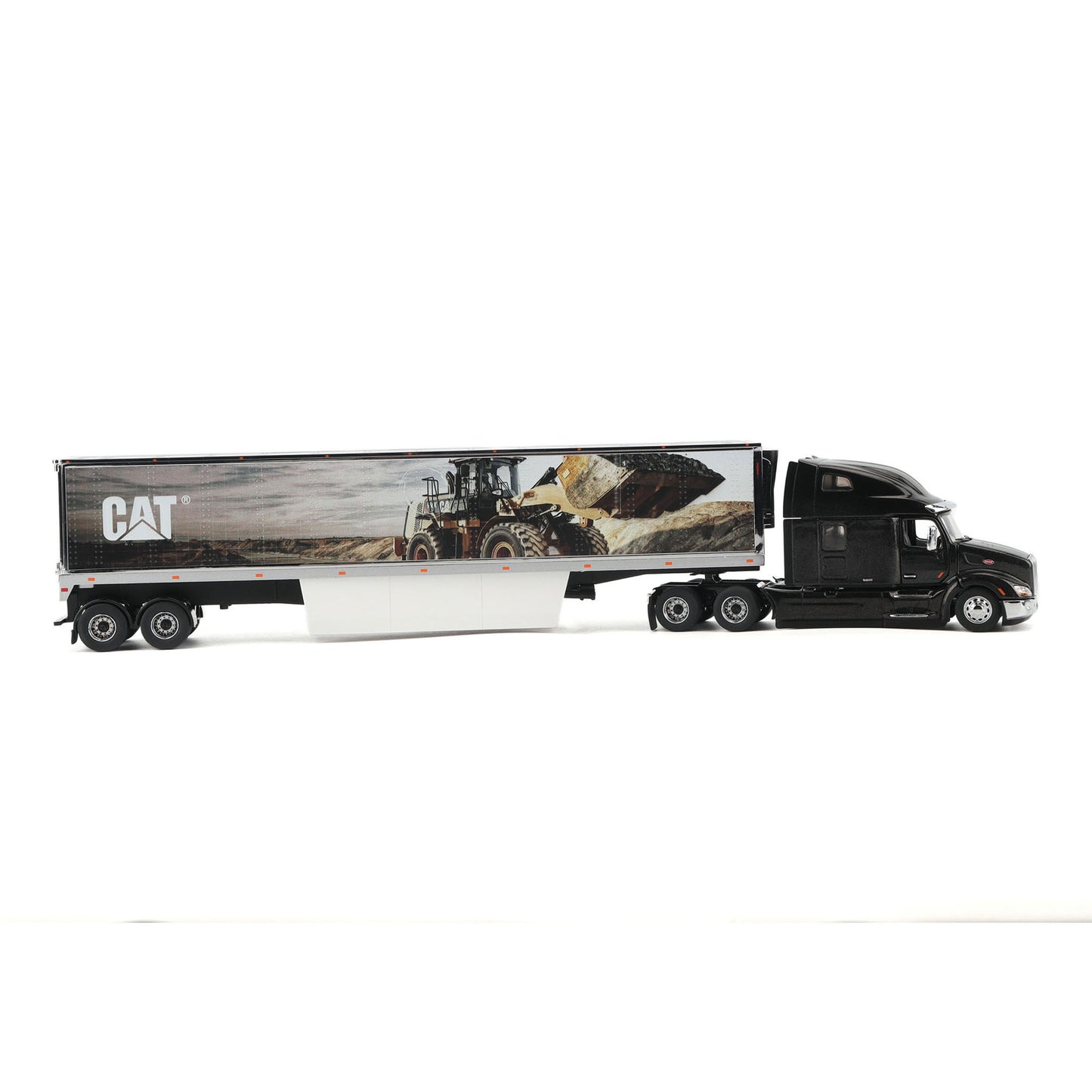 A diecast model of a semi-truck with a black cab and a white trailer featuring a CAT construction graphic, shown against a plain white background.