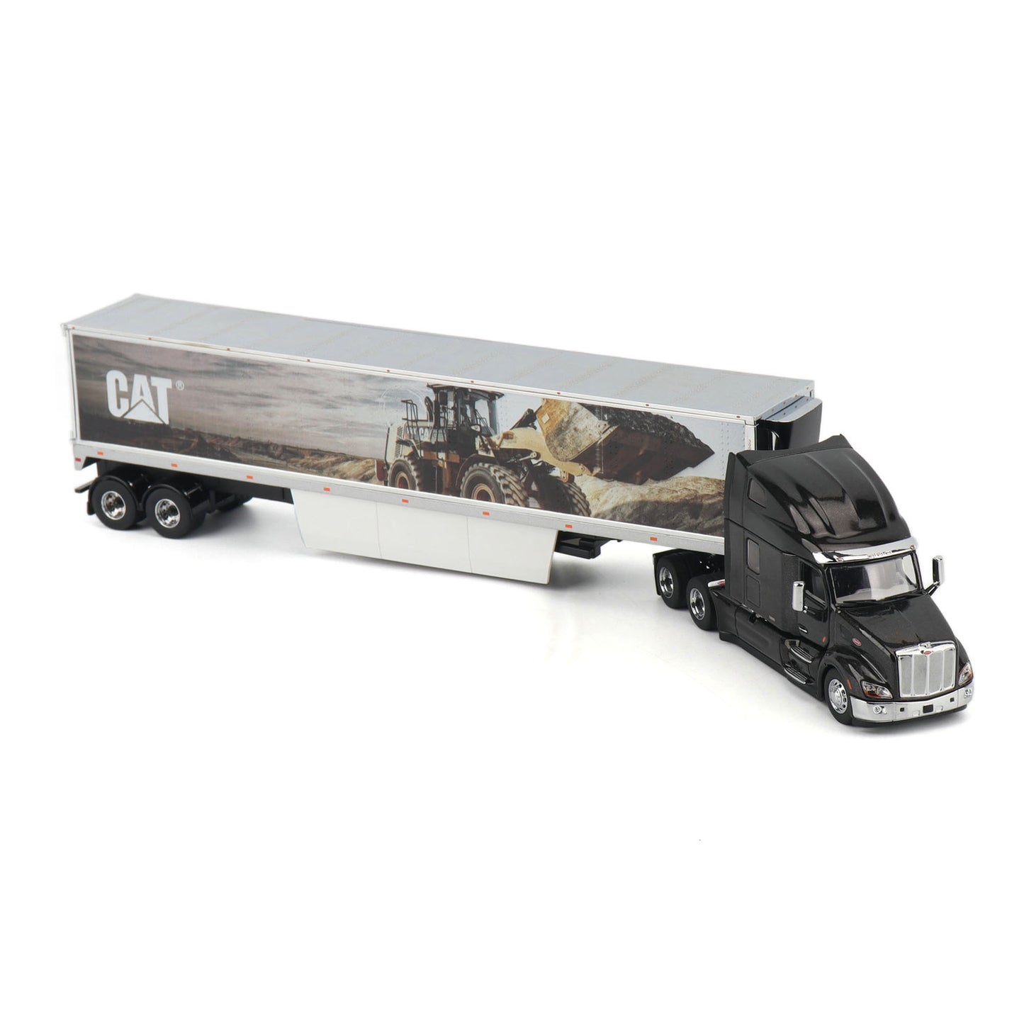 A diecast model of a semi-truck with a black cab and a silver trailer printed with a CAT construction graphic, shown on a white background.