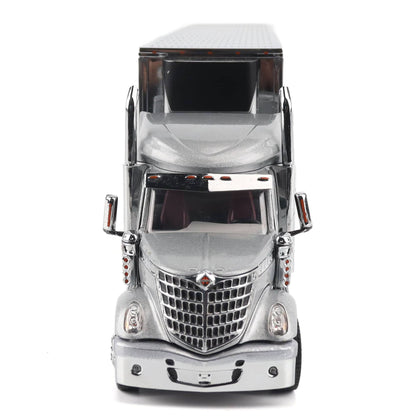 A metallic silver toy semi-truck with a detailed chrome grille and realistic mirrors, photographed from the front against a plain white background.