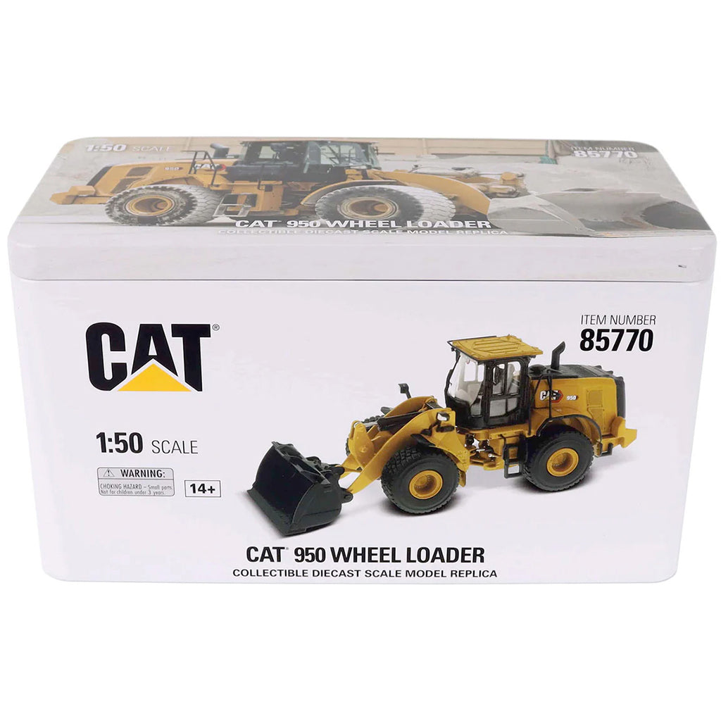 Box packaging of a CAT 950 Wheel Loader model toy with branding and specifications.