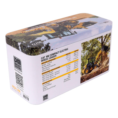 A rectangular metal tin box for a CAT 906 Compact Electric Wheel Loader, featuring printed graphics of yellow construction equipment and technical specifications on a white background.