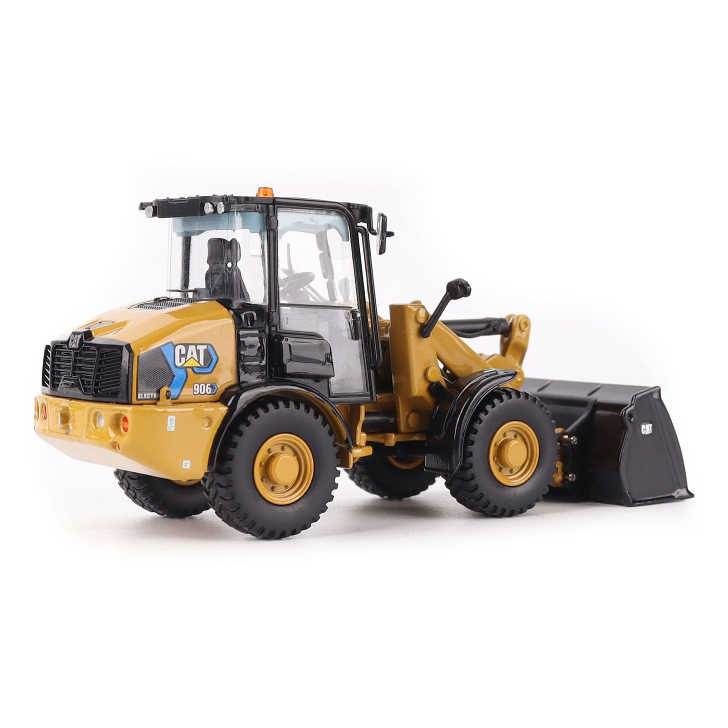 1:50th scale model of a Caterpillar 906M Electric Compact Wheel Loader photographed on a white background
