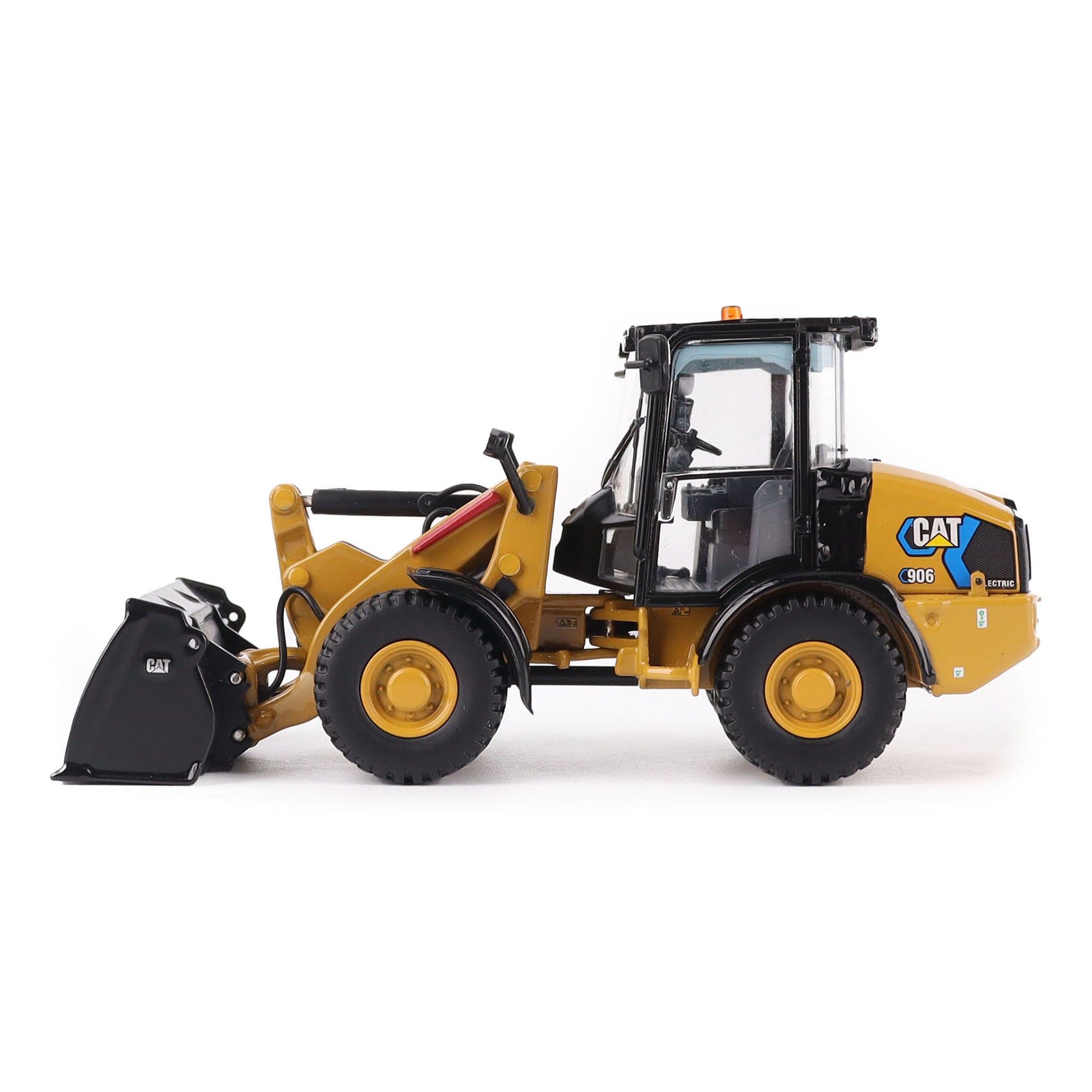 1:50th scale model of a Caterpillar 906M Electric Compact Wheel Loader photographed on a white background