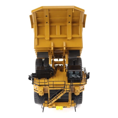 1:50 Scale Diecast Model of a Cat Yellow Caterpillar 789 Mining Truck on a White Background
