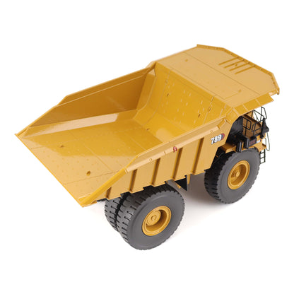 1:50 Scale Diecast Model of a Cat Yellow Caterpillar 789 Mining Truck on a White Background