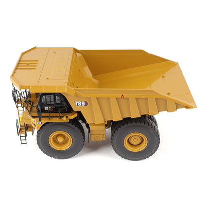1:50 Scale Diecast Model of a Cat Yellow Caterpillar 789 Mining Truck on a White Background