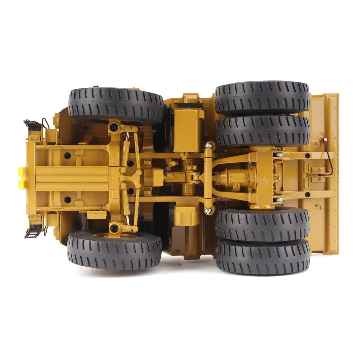 1:50 Scale Diecast Model of a Cat Yellow Caterpillar 789 Mining Truck on a White Background