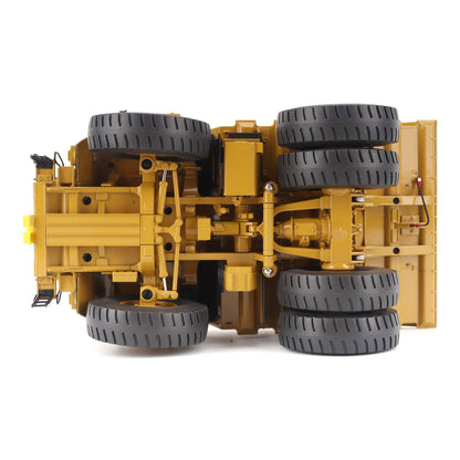 1:50 Scale Diecast Model of a Cat Yellow Caterpillar 789 Mining Truck on a White Background