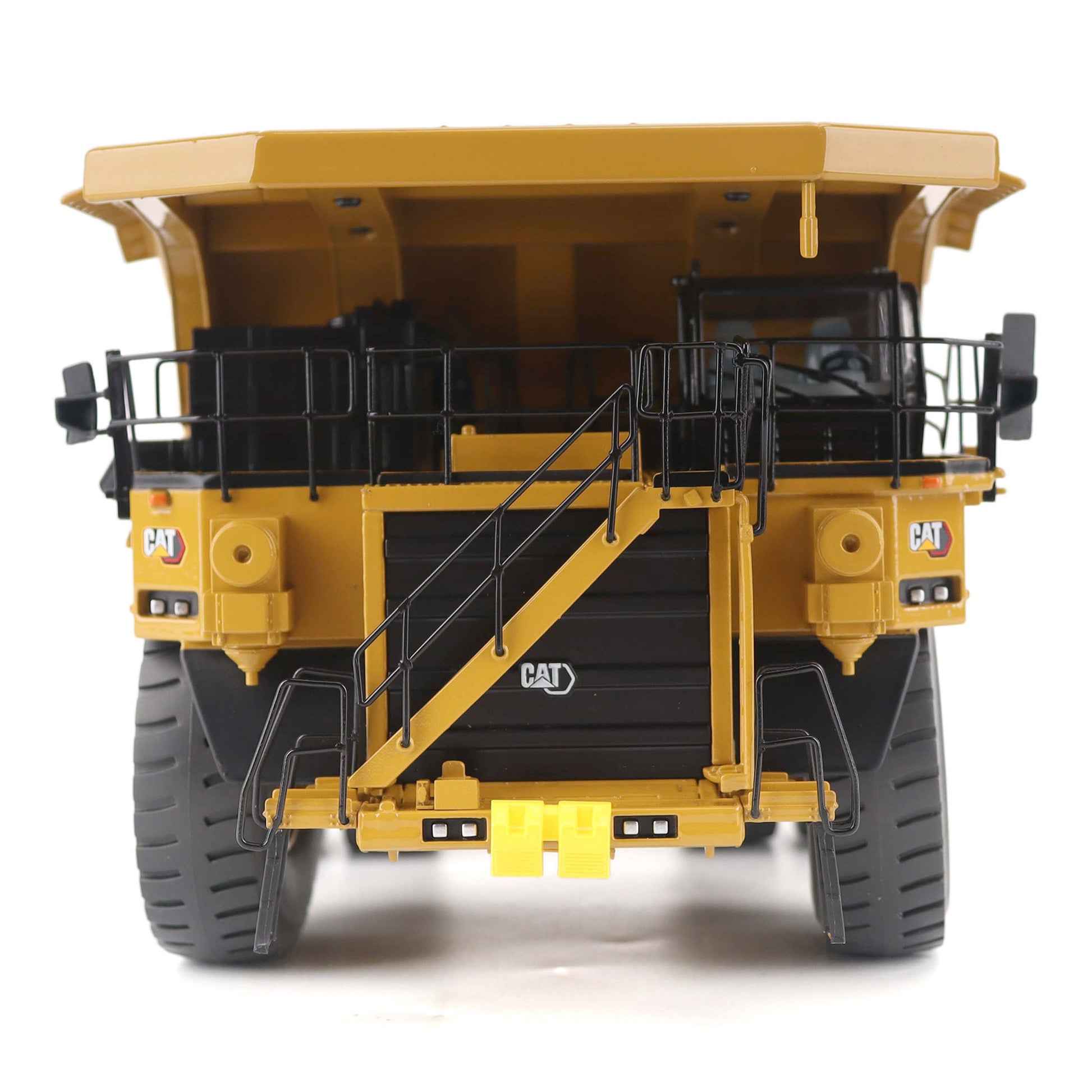 1:50 Scale Diecast Model of a Cat Yellow Caterpillar 789 Mining Truck on a White Background