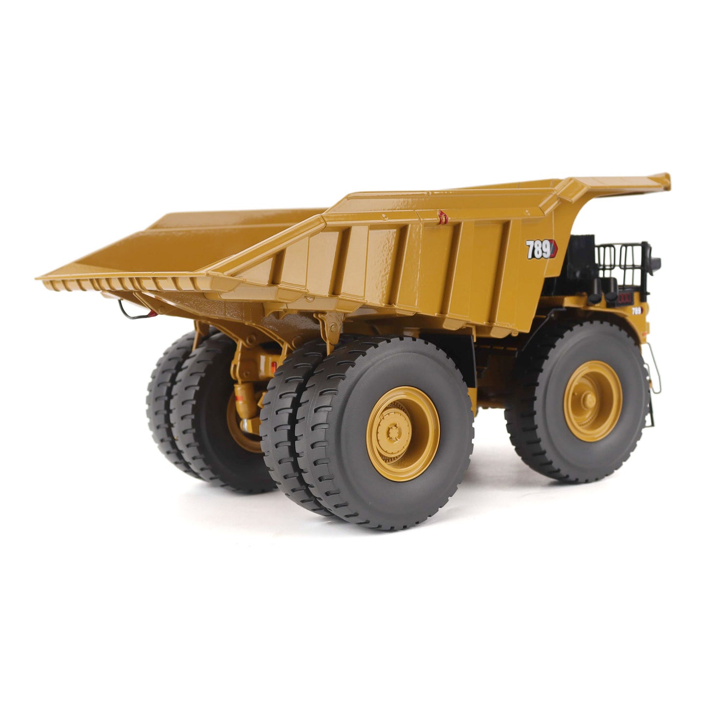 1:50 Scale Diecast Model of a Cat Yellow Caterpillar 789 Mining Truck on a White Background