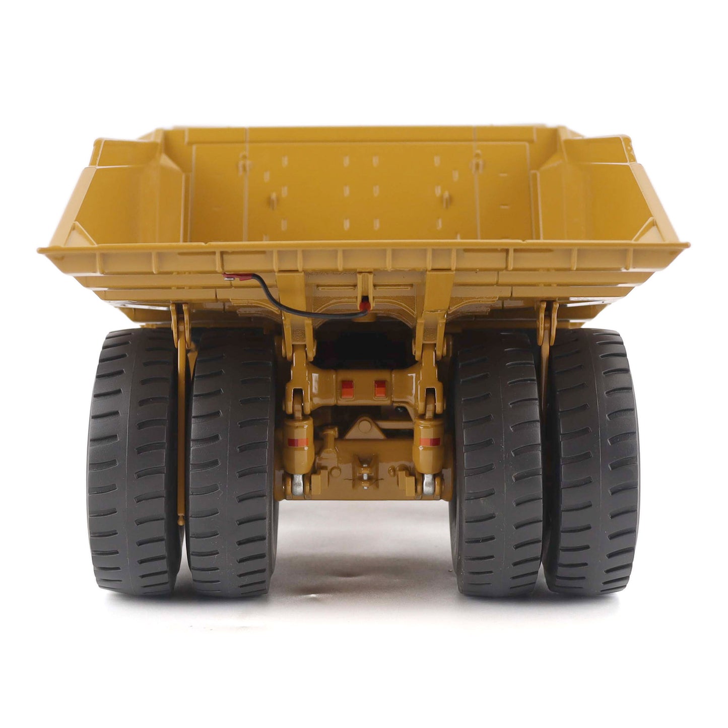 1:50 Scale Diecast Model of a Cat Yellow Caterpillar 789 Mining Truck on a White Background