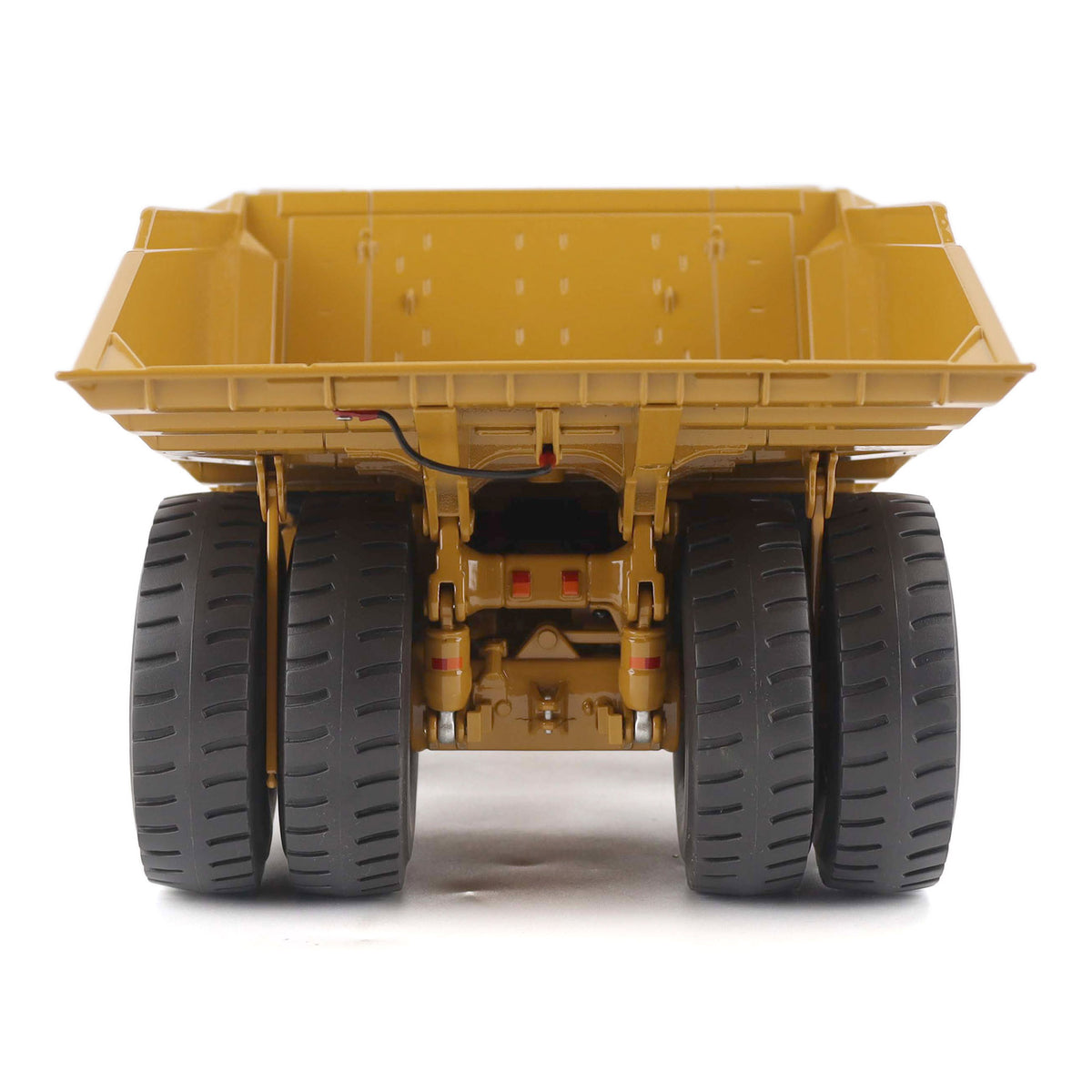 1:50 Scale Diecast Model of a Cat Yellow Caterpillar 789 Mining Truck on a White Background
