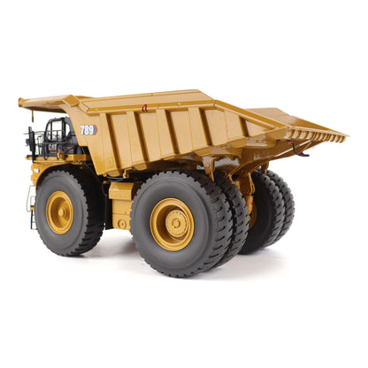 1:50 Scale Diecast Model of a Cat Yellow Caterpillar 789 Mining Truck on a White Background