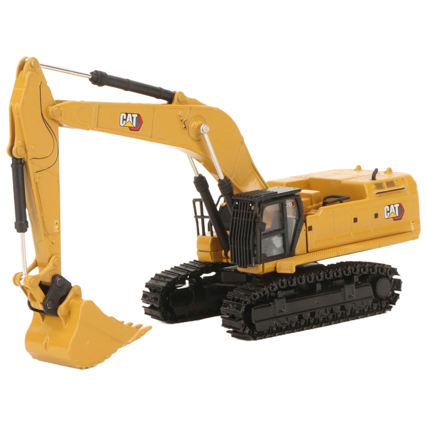 A yellow CAT model 395 excavator with black tracks and a yellow bucket, photographed on a clean white background.