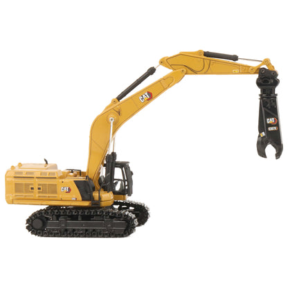 A yellow CAT model 395 excavator with black tracks and a yellow bucket, photographed on a clean white background.