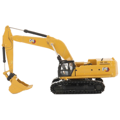 A yellow CAT model 395 excavator with black tracks and a yellow bucket, photographed on a clean white background.