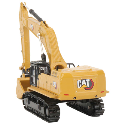 A yellow CAT model 395 excavator with black tracks and a yellow bucket, photographed on a clean white background.